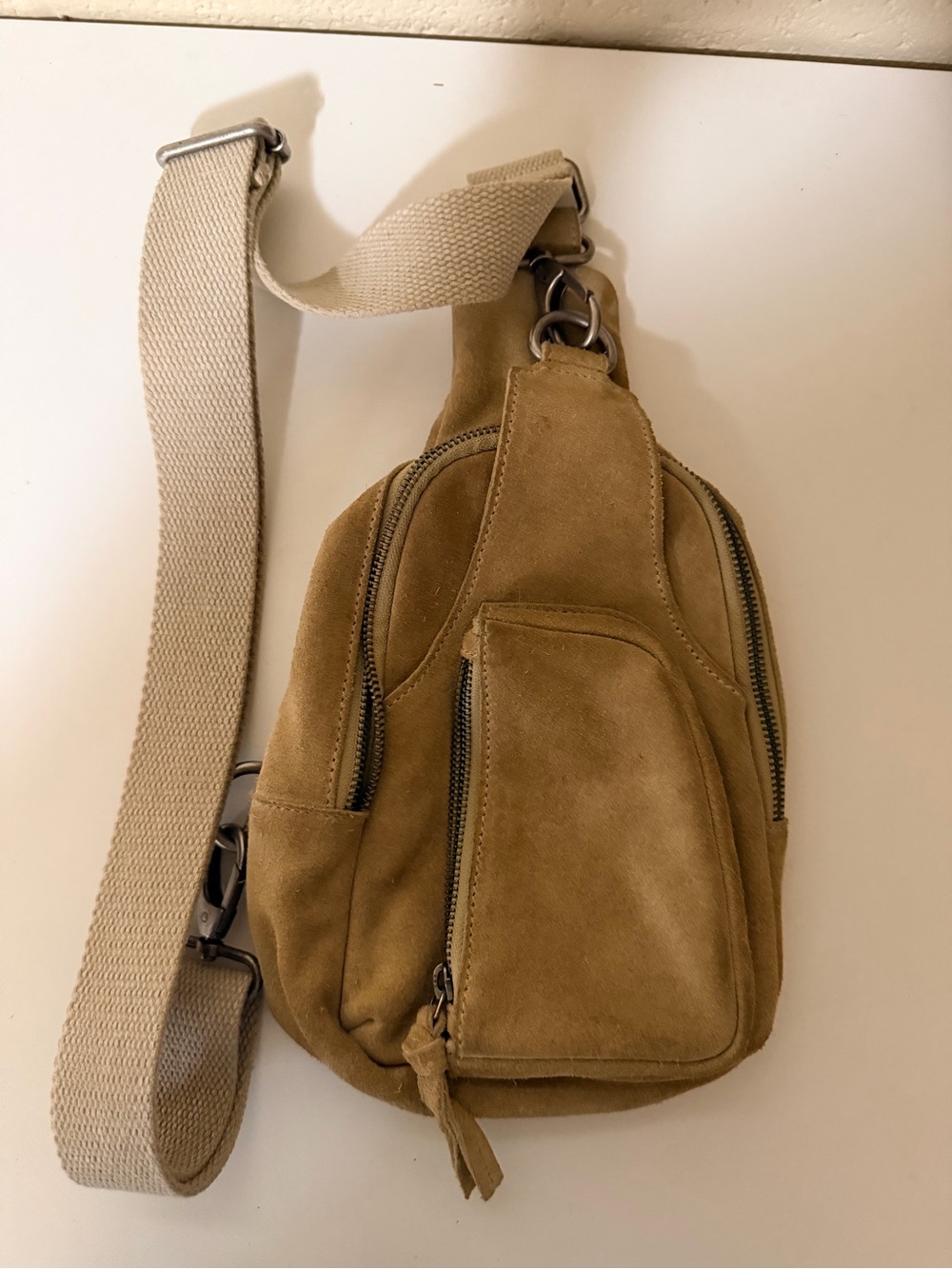 Free People tan suede crossbody sling bag with cream strap